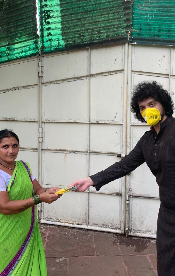 Namashi Chakraborty distributing Mask