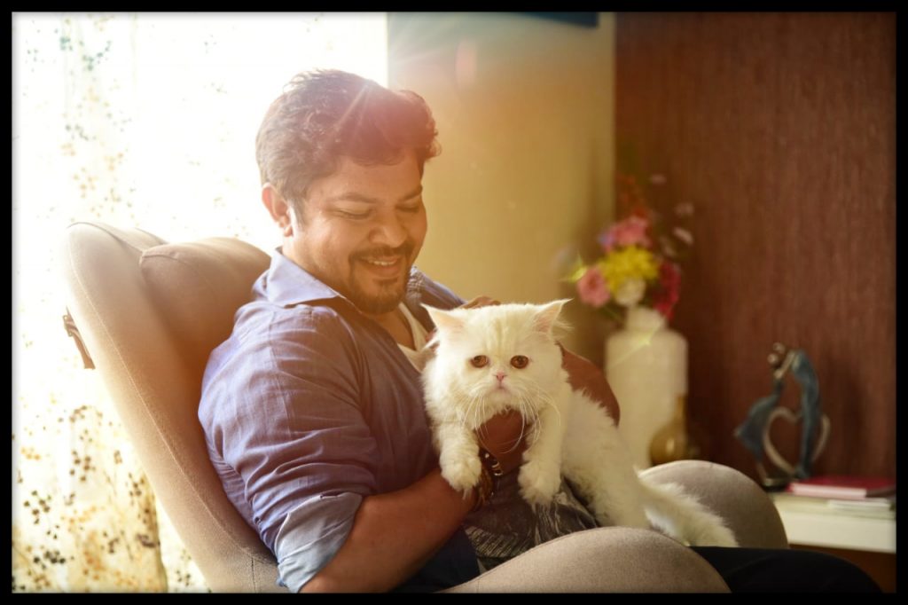 Ram Kamal with Snowy The Cat