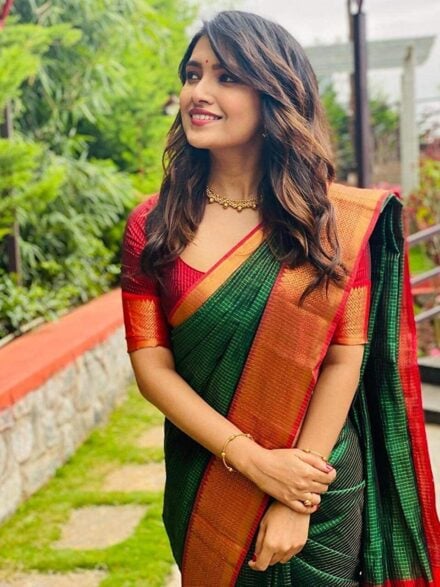 Your Sawan Wardrobe Guide: Classic Green Saree with Red Blouse Pairings