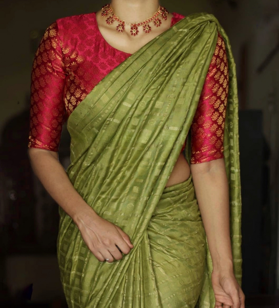 Your Sawan Wardrobe Guide: Classic Green Saree with Red Blouse Pairings